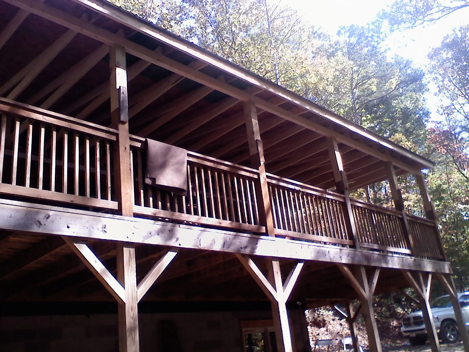 Timber framing under a new elevated porch and deck — Roof Leak Repair in Grand View by Roofing Brothers